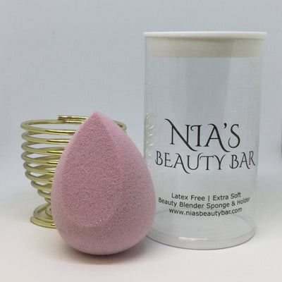 Champagne Pink - Slanted - Teardrop Cut - Beautyblender Sponge with Holder and Travel Case - Hydrophilic Foam Sponge - Latex free - Extra soft for a streak free - even blend - Non-irritating, - Non-allergenic - Odorless - Long-lasting, - washable and reusable - Travel Pod - 3 in 1 - Color - Champagne Pink - Pink