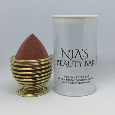 Chestnut - Slanted Teardrop Cut - Chestnut - Slanted Teardrop Cut - Beautyblender Sponge with Holder and Travel Case - Hydrophilic Foam Sponge - Latex free - Extra soft for a streak free - even blend - Non-irritating, - Non-allergenic - Odorless - Long-lasting, - washable and reusable - Travel Pod - 3 in 1 - Color - Chestnut - Brown - Slanted Cut